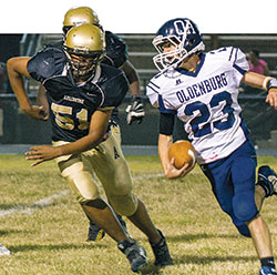 Running back Luke Roberts heads up field for the Oldenburg Academy football team during a game against Arlington High School in Indianapolis this year. (Submitted photo)