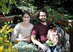 Melanie and Pete Kuester enjoy spending time with Margaret “Maggie” Katherine, the newborn baby girl they adopted in August, pictured here at 10 weeks. After a miscarriage and ongoing infertility issues, the couple adopted Maggie through St. Elizabeth/Coleman Pregnancy and Adoption Services in Indianapolis. (Photo by Natalie Hoefer)