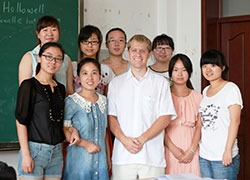 Above, Seminarian Tony Hollowell poses with some of the college students to whom he taught English during three weeks in China. (Submitted photo)