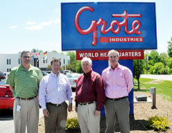 Mike Grote, left, Dominic Grote, Bill Grote and Rick Grote pose on May 13 in front of the factory of their family business located in Madison. Mike and Rick are nephews of Bill. Dominic is Bill’s son. Grote Industries won an important religious liberty victory in a Nov. 8 ruling handed down by a three-judge panel of the 7th U.S. Circuit Court of Appeals in Chicago. (File photo by Sean Gallagher)