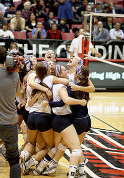 Our Lady of Providence Jr./Sr. High School players celebrate winning the Class 2A state volleyball championship on Nov. 9 at Ball State University’s Worthen Arena in Muncie. (Submitted photo)