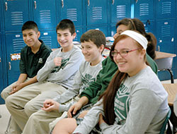 Seventh-grade students at Holy Spirit School in Indianapolis share a laugh during a weekly anti-bullying session designed to make students focus on treating people with respect and kindness. (Photo by John Shaughnessy)