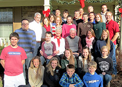 The extended family of Ed and Val Fillenwarth of Christ the King Parish in Indianapolis pose for a photo during the Christmas holiday. The couple has contributed to a legacy of Catholic education and faith for their children and grandchildren. (Submitted photo)