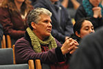 Woman praying at pro-life event
