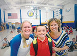 Teachers with child