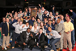 The Cathedral High School wrestling team in Indianapolis and its ‘family’ celebrate winning their first-ever state championship on Feb. 22.