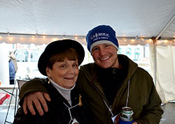 Macklin Swinney poses for a photo with his grandmother, Kathleen Murphy, on the grounds of St. John the Evangelist Parish in Indianapolis during a Christmas event in December of 2013. After being diagnosed with the most severe stage of skin cancer, the 27-year-old Swinney has become a member of the Catholic Church. (Submitted photo)