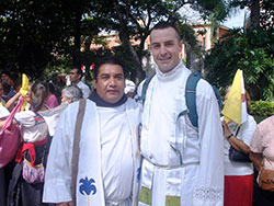 Father Dustin Boehm, right, poses with Franciscan Father Jose Luis on July 10, 2013, in Cuernavaca, Mexico after the installation of Bishop Ramon Castro as the new bishop of Cuernavaca. Father Boehm spent three months in Mexico in 2013 to learn Spanish and the culture of the Mexican people. (Submitted photo)