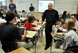 Transitional Deacon Adam Ahern speaks on Aug. 12 with students in a theology class at Cathedral High School in Indianapolis. (Photos by Sean Gallagher)