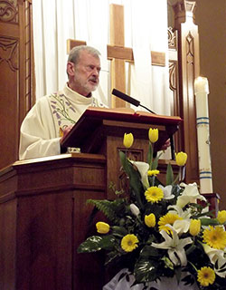 Father Stanley Herber delivers a homily during the Mass celebrating his 50th jubilee on May 4 at St. Gabriel Church in Connersville. (Submitted photo)