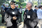 Priest and bishop speak