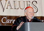 Cardinal McCarrick speaking at event