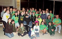 Band members of Father Michael Shawe Memorial Jr./Sr. High School in Madison pose on Oct. 17 with Father Hilary Meny outside SS. Peter and Paul Church in Haubstadt, Ind., in the Evansville Diocese. Father Meny has been a longtime supporter of Shawe’s band, which also became a marching band for the first time this school year. (Submitted photo)