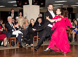 Father Aaron Pfaff and Salley Dooley dance a quickstep to Louis Prima’s “Sing Sing Sing” during the Nov. 8 “Dancing with the Shelby County Stars” fundraising event at Indiana Grand Racing and Casino in Shelby County. Father Pfaff is pastor of St. Joseph Parish in Shelbyville and sacramental minister of St. Vincent de Paul Parish in Shelby County. The event benefitted two non-profit organizations—Shelby Senior Services Inc. and Shelby County Players. (Submitted photo by Warren Robison)