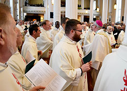 Bishop Christopher J. Coyne greets priests from the Archdiocese of Indianapolis who attended the Jan. 29 liturgy in which Bishop Coyne was installed as the new bishop of the Diocese of Burlington. (Photo by Cori Fugere Urban, Vermont Catholic magazine)