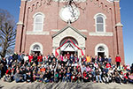 People in front of church building