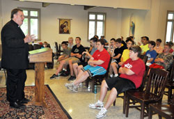 Archbishop Joseph W. Tobin speaks on June 18, 2014, at Bishop Bruté College Seminary in Indianapolis to Bishop Bruté Days participants. (Criterion file photo by Sean Gallagher)