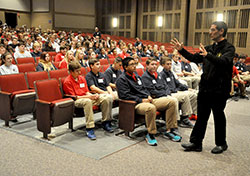 Father Eric Augenstein, archdiocesan vocations director, speaks about vocations on Oct. 28 to freshmen at Roncalli High School in Indianapolis. (Photos by Sean Gallagher)