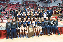Our Lady of Providence Jr./Sr. High School players and coaches are pictured with the Class 3A state volleyball trophy on Nov. 7 at Ball State University’s Worthen Arena in Muncie. (Submitted photo)