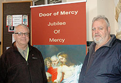 As part of their journey to re-establishing the special bond they had in their childhood, Norb Schott, left, and Ted Schott made a visit to SS. Peter and Paul Cathedral in Indianapolis, where the brothers walked together through the cathedral’s “door of mercy.” (Photo by John Shaughnessy)