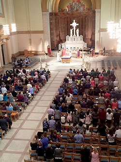 Around 400 members of St. Malachy Parish in Brownsburg made a pilgrimage to SS. Peter and Paul Cathedral in Indianapolis on March 6 to walk through the Doors of Mercy and celebrate Mass with their pastor, Father Vincent Lampert. (Submitted photo by Marian Knueven)