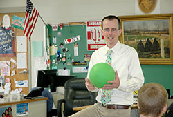 Doug Bauman adds real-life applications to the math classes he teaches at St. Barnabas School in Indianapolis, and he multiplies his influence on his students by sharing his faith and emphasizing service—qualities that led him to be selected as this year’s recipient of the Saint Theodora Guérin Excellence in Education Award, the highest honor for a Catholic educator in the archdiocese. (Photo by John Shaughnessy)