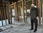 Priest in building