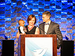 Couple with child at banquet