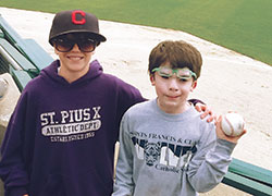 Brendan McCormick, left, and Johnny Malan had never met until a magical moment at an Indianapolis Indians’ baseball game earlier this year brought the two Catholic school students together. (Submitted photo)