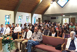 Family members and friends of Denise Knott-Stoehr gather on June 7 in the chapel of Our Lady of Fatima Retreat House in Indianapolis for the funeral of a homeless woman who had benefitted in recent years from the Ignatian Spirituality Project retreats for homeless people hosted there. (Submitted photo)