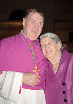 Cardinal-designate Joseph W. Tobin poses with his mother, Marie Tobin, on Oct. 9, 2010, after he was ordained an archbishop at St. Peter’s Basilica at the Vatican. (Criterion file photo)
