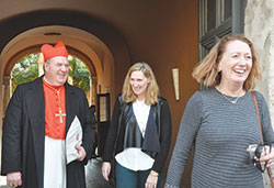 Cardinal Joseph W. Tobin is pictured with his sisters Sara Broderick, center, and Margo Tobin on Nov. 20 in Rome. (Photo by John Shaughnessy)