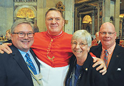 Greg Otolski, left, archdiocesan director of communications; Cardinal Joseph W. Tobin; Theresa Brydon, executive assistant to the cardinal; and Loral Tansy, who has assisted Cardinal Tobin as master of ceremonies during liturgies in the archdiocese, are pictured in St. Peter’s Basilica at the Vatican on Nov. 19.