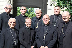 The bishops of Indiana pose during a May 14, 2015, meeting of the Indiana Catholic Conference in Evansville, Ind. They are, from left in the front row, Bishops Dale J. Melczek, retired bishop of Gary, Charles C. Thompson of Evansville, Kevin C. Rhoades of Fort Wayne-South Bend, and William L. Higi, retired bishop of Lafayette. In the second row, from left, are Bishops Donald J. Hying of Gary, Timothy L. Doherty of Lafayette, Gerald A. Gettelfinger, retired bishop of Evansville, and Archbishop Joseph W. Tobin. (Submitted photo) 