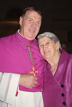 Archbishop Joseph W. Tobin poses with his mother, Marie Tobin, on Oct. 9, 2010, after he was ordained an archbishop at St. Peter’s Basilica at the Vatican. (Criterion file photo)