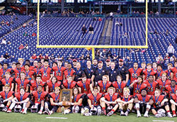 The football team of Cardinal Ritter Jr./Sr. High School in Indianapolis is pictured on Nov. 25 in Lucas Oil Stadium after winning the Indiana class 2A state football championship. (Submitted photo) 