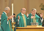 Msgr Stumpf (center) with priests