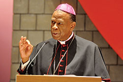Bishop Edward K. Braxton of Belleville, Ill., makes a point at St. Thomas Aquinas Church in Indianapolis while speaking on the racial divide in the Church on Feb. 18. (Photo by Natalie Hoefer)