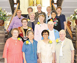Nine Sisters of Providence of Saint Mary-of-the-Woods pose on June 24 at Saint Mary-of-the-Woods as they celebrate their 50-year jubilees. The jubilarians are, front row: Providence Sisters Marianne Mader, left, Celeste Tsai, Editha Ben and Danielle Sullivan; second row: Providence Sisters Paula Damiano, left, Mary Montgomery and Jean Kenny; third row: Providence Sisters Barbara McClelland, left, and Delan Ma. They are pictured with General Councilors in the back row: Providence Sisters Mary Beth Klingel, left, Jeanne Hagelskamp, Lisa Stallings, Jenny Howard and Dawn Tomaszewski. (Submitted photo)