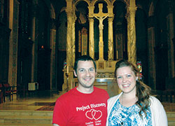 When siblings Danny and Katie Klee prayed separately about finding a way to help people in need, they both came up with the plan to reach out to people in prison. The siblings are pictured in their home parish, St. Joan of Arc in Indianapolis, where they have established a chapter of an international prayer community. (Photo by John Shaughnessy)