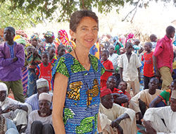 Dr. Ellen Einterz, who grew up in St. Matthew the Apostle Parish in Indianapolis, stops to have her photo taken during a community gathering in Cameroon, the African country where she provided love and medical care during the 24 years she served the people there. (Submitted photo)