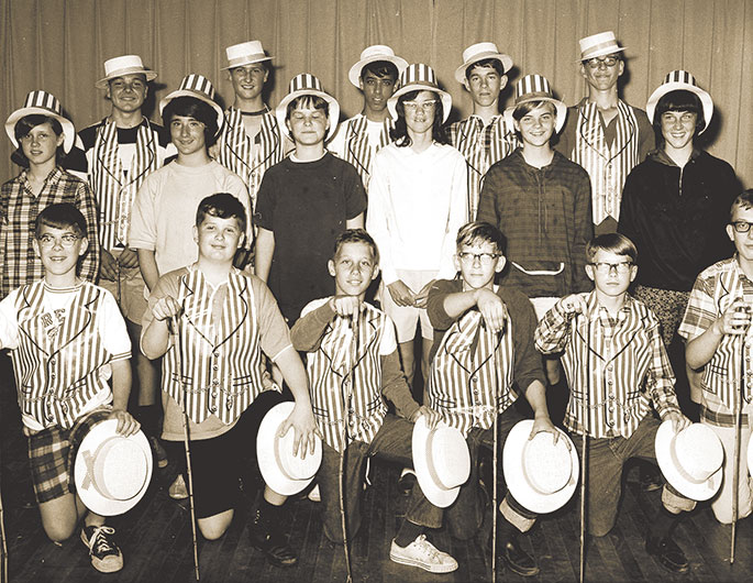 This photo shows a group of students at Holy Name of Jesus Parish in Beech Grove in April 1967 during the dress rehearsal for the annual musicale. The musicale featured appearances by the school band, the seventh-and eighth-grade chorus, and the boys’ and girls’ choirs. The production also included dances and other instrumental performances, and was directed by Holy Name’s longtime music director Jerry Craney. The parish is well-known for a strong music program, featuring an annual Christmas concert that was in its 54th year this past December.