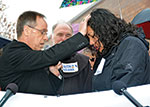 Archbishop blessing woman