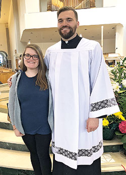 Jenna Knepper, who was received into full communion of the Church during the Easter Vigil Mass on March 31 at St. Joan of Arc Church in Indianapolis, smiles with her twin brother, Joseph Knepper, a seminarian for the Fort Wayne-South Bend, Ind., Diocese, after the Easter Mass on April 1 at St. Vincent De Paul Church in Fort Wayne. (Submitted photo)