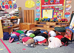 Pre-kindergarten students at St. Patrick School in Terre Haute take part in a school safety drill. (Submitted photo)