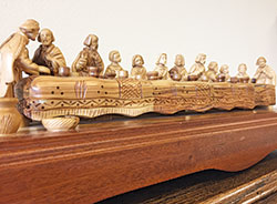 Depictions of the Last Supper, similar to this olive wood piece made in the Holy Land, will be on display during the summer festivals held at three of the four campuses of All Saints Parish in Dearborn County this summer. (Photo by Natalie Hoefer)