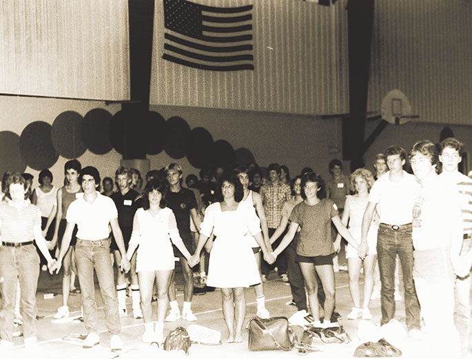 This photo depicts teens attending a Connersville Youth Deanery Day at the Golay Center in Cambridge City on Aug. 21, 1983. The event included Mass, dinner, discussion groups and social activities. The event was made possible through grants from the archdiocese for youth ministry programs that were received by four deaneries in central and southern Indiana that year.