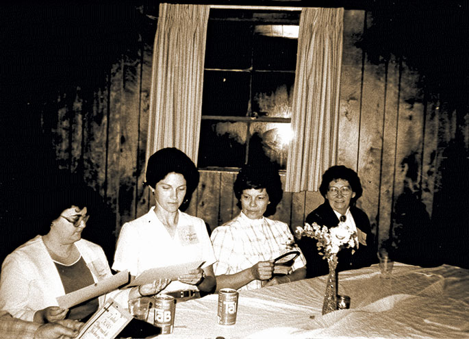 This photo shows a group of catechists from St. Boniface Parish in Fulda at a Catechist Recognition Dinner hosted by the Tell City Deanery on May 10, 1984. The evening included a talk by Father Bill Deering of Holy Rosary Parish in Evansville, Ind., in the Evansville Diocese. The catechists who had participated in the archdiocesan catechist certification program received their certificates at this dinner.
