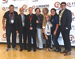 The members of the archdiocese’s delegation to the V Encuentro gathering in late September in Texas pose for a group photo: Francisco Ruiz, left, Oscar Castellanos, Archbishop Charles C. Thompson, Giselle Duron, Anne Corcoran (back), Dianna Perez (front), Gabriela Ross and Saul Llacsa. (Submitted photo)