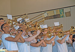 As part of their fall break of doing service projects in the Indianapolis area, members of the University of Notre Dame marching band perform a special concert on Oct. 17 for more than 100 people at A Caring Place, the adult day care program of Catholic Charities Indianapolis. (Photo by John Shaughnessy)